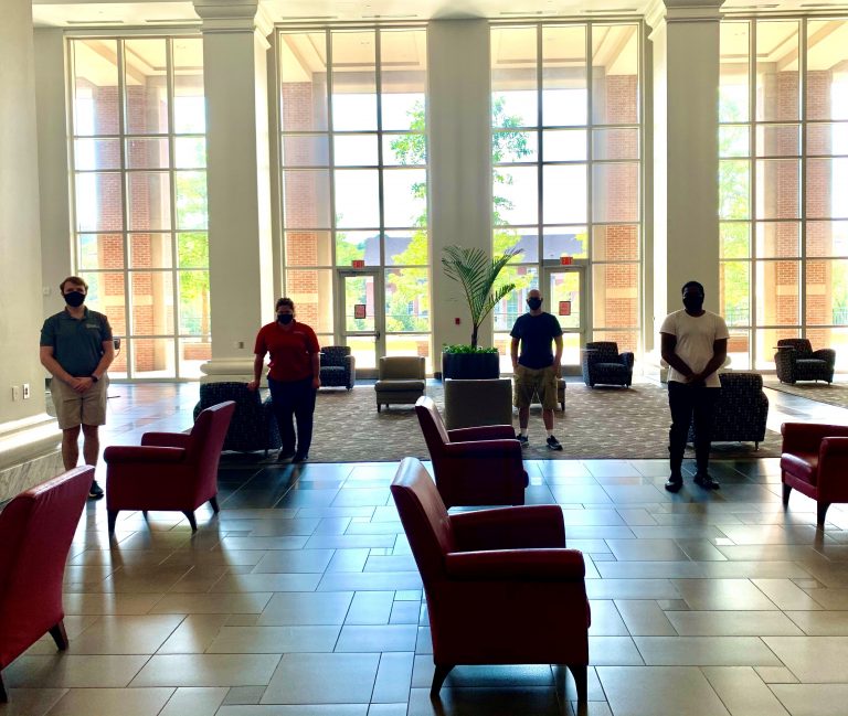 Multiple students standing.