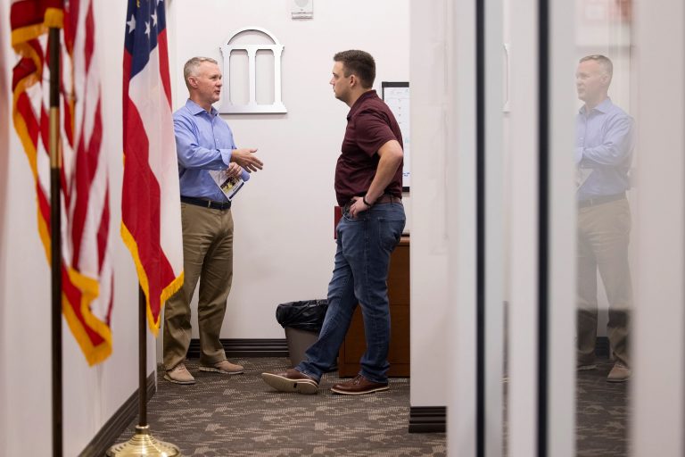 Jon Segars conversing with someone.