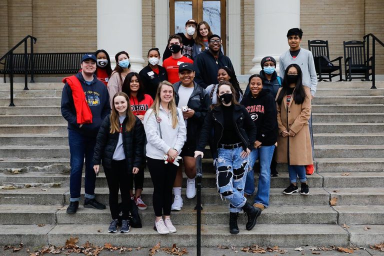 Multiple students on the UGA Stairwell.