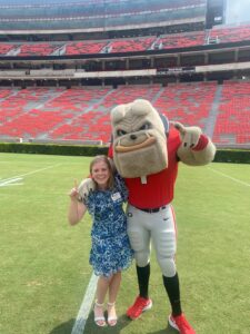 A photo of Hairy Dawg and a woman
