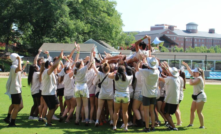 Dawg camp silver team celebrating victory on Legion Field
