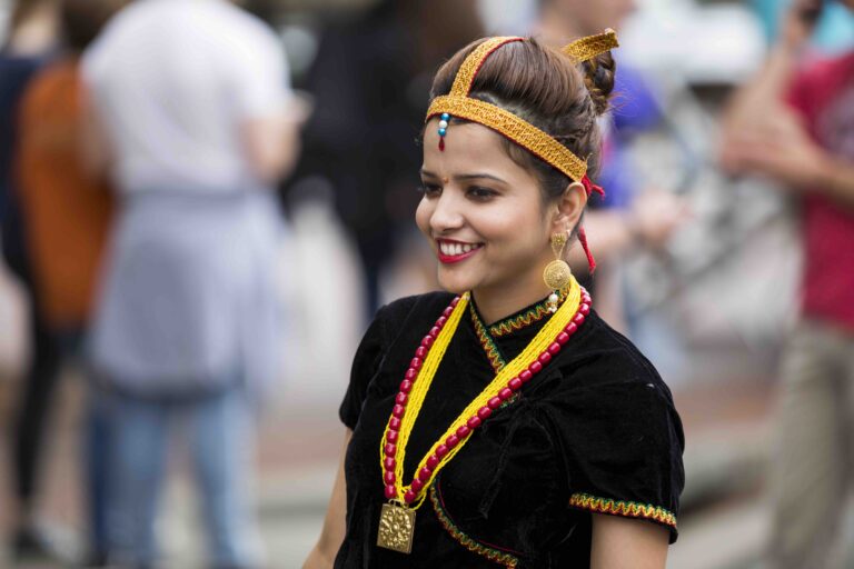 A woman wears her traditional outfit at the International Street Festival in downtown Athens, Georgia.