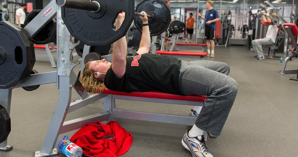 Someone lifting weights.