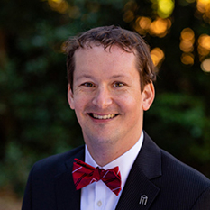 William Draper, Associate Director of Development.